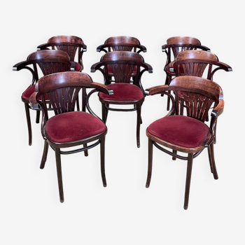 Lot de 8 fauteuils bistrot vauzelle a palmettes bois foncé et velours rouge