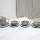 Series of 3 cups, a milk jar and 4 antique porcelain saucers