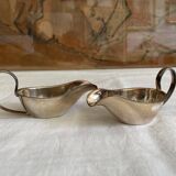 Set of two silver metal saucepans
