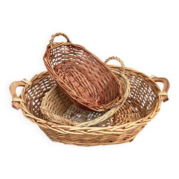 Set of three wicker baskets with handles