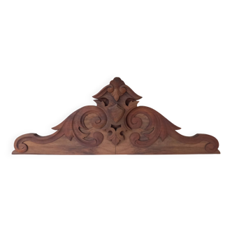 Old sandblasted wooden pediment