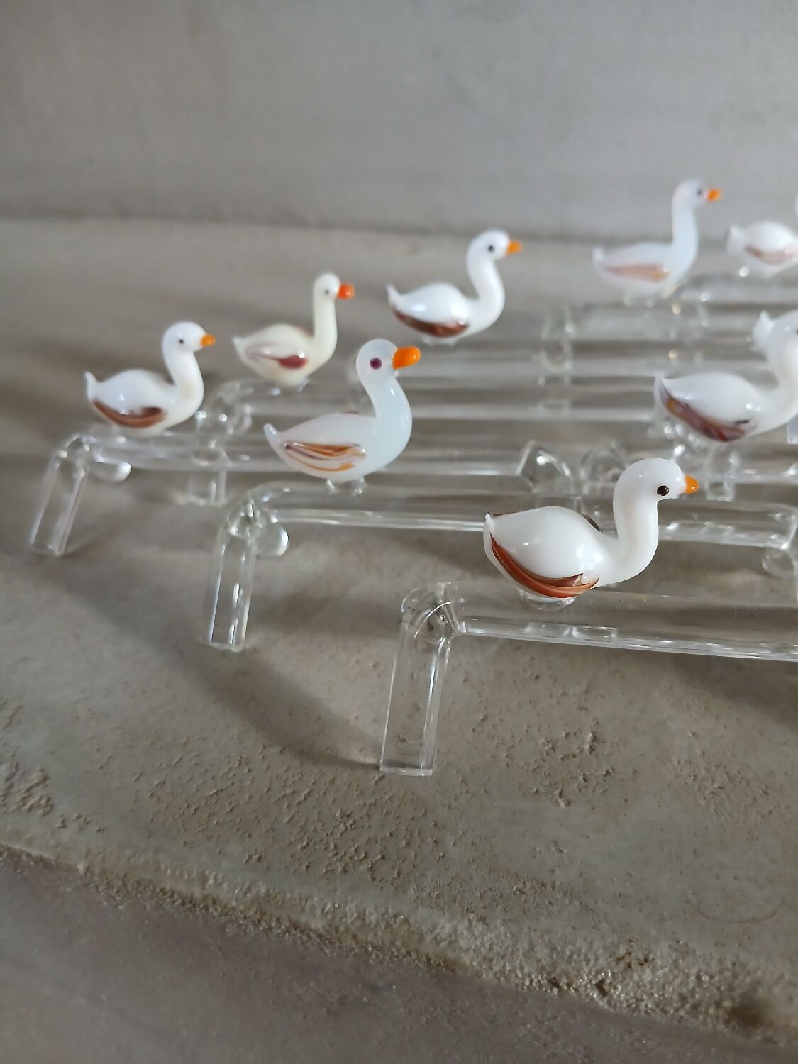 14 antique glass knife rests / ducks