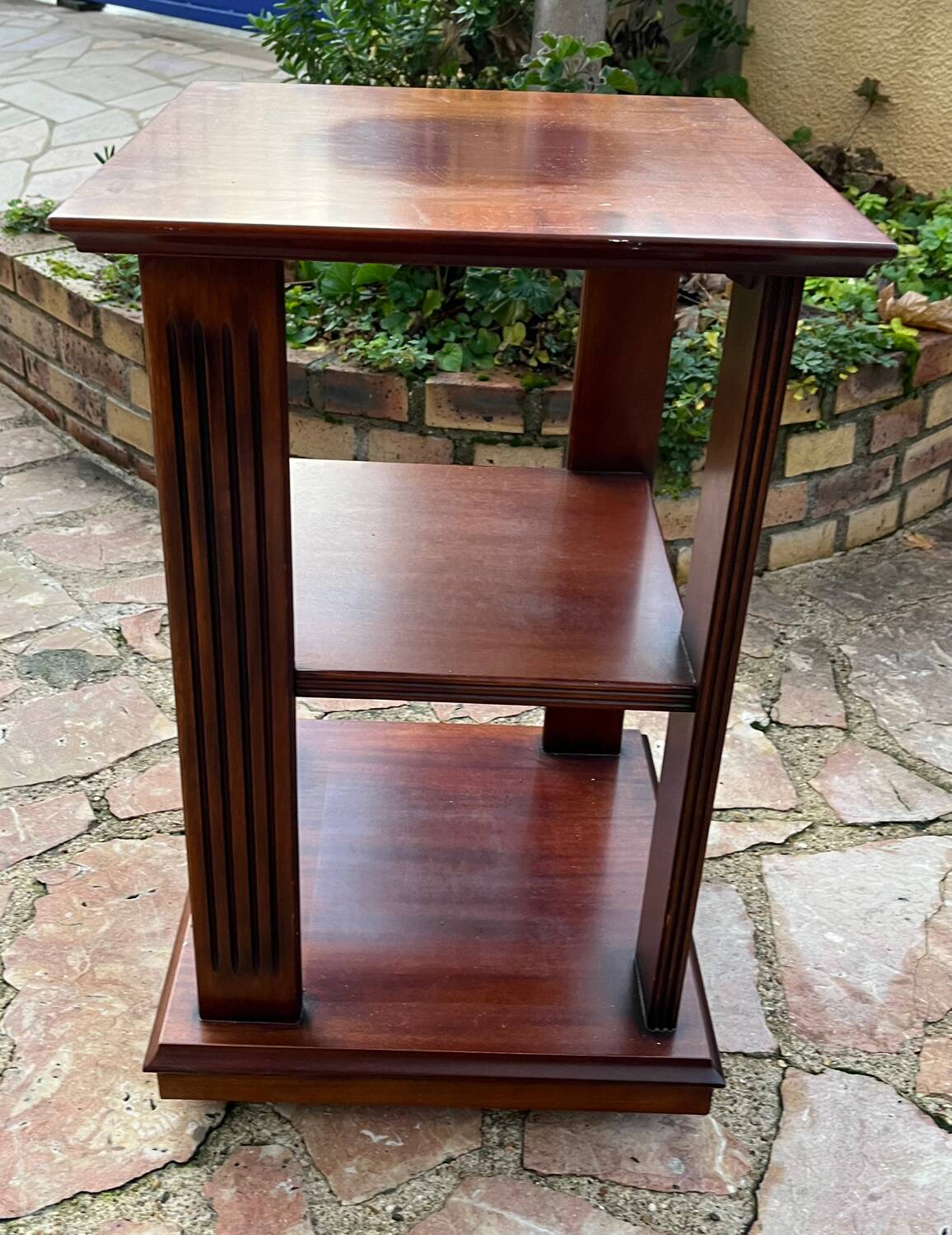 Vintage wooden shelf on caster legs