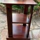 Vintage wooden shelf on caster legs