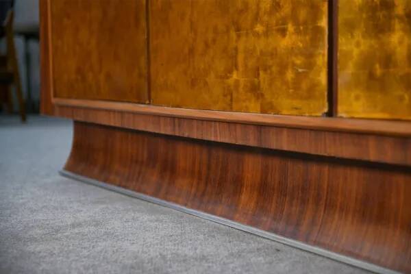Art Deco rosewood sideboard with gilt door, attributed to Maison Dominique, 1940s