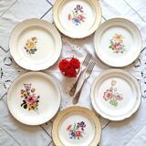 Flat earthenware plates with gilded edges