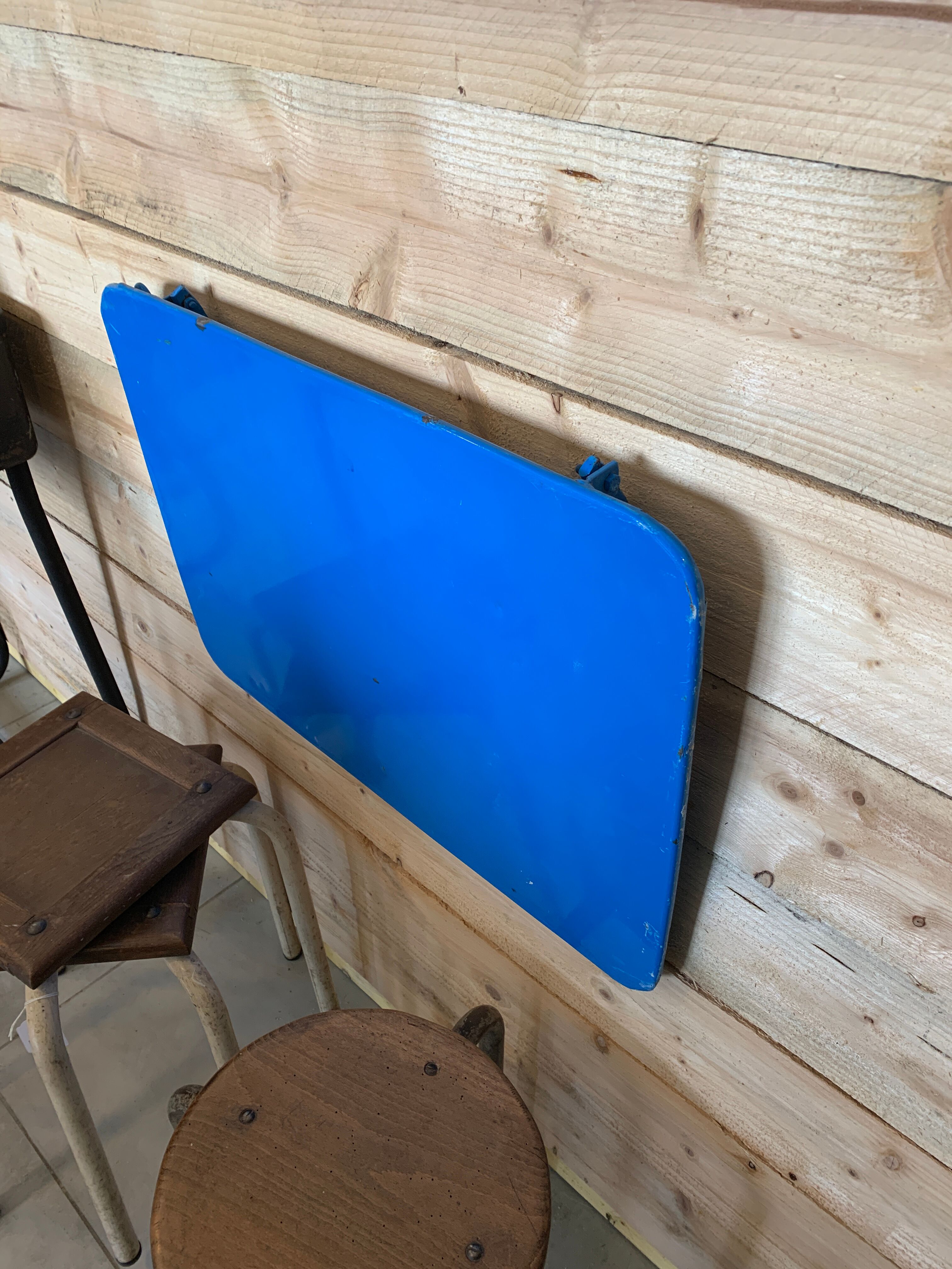 Folding iron wall table