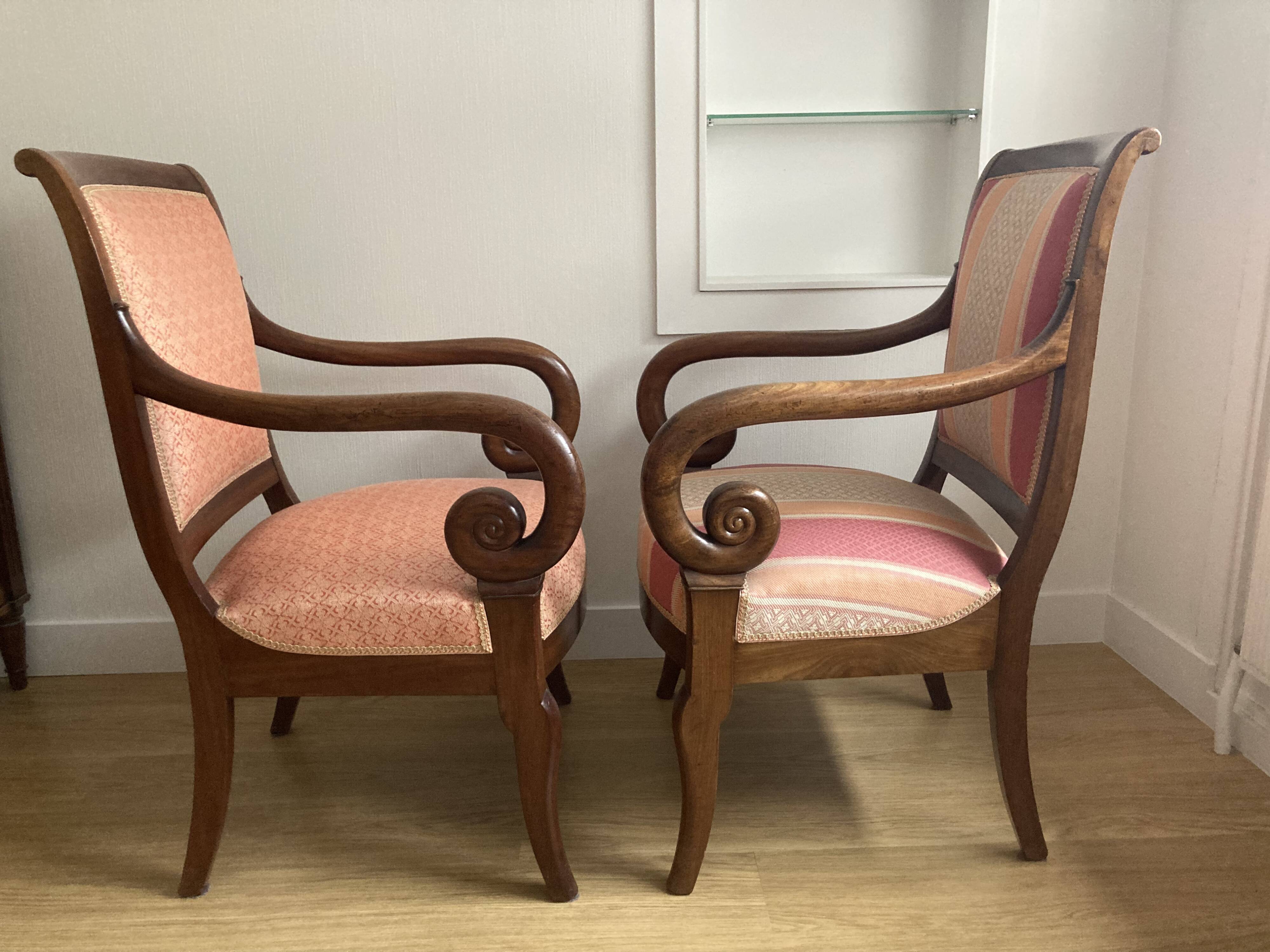 Pair of Restoration style armchairs with curved arms and cabriole legs