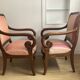 Pair of Restoration style armchairs with curved arms and cabriole legs