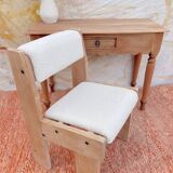 Brutalist chair in wood and boucle