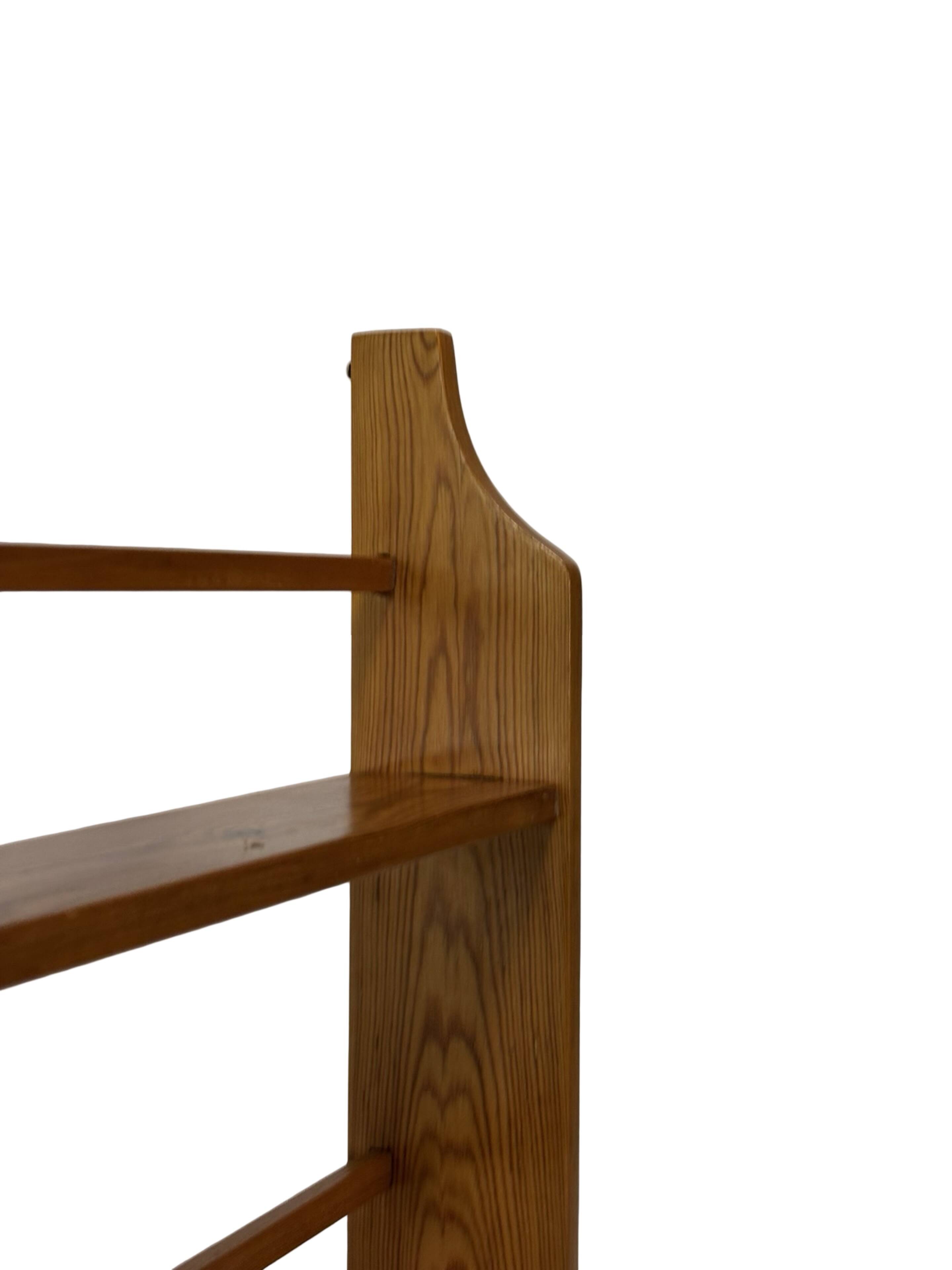 Vintage wooden wall shelve rack bookshelf in pinewood minimalist design
