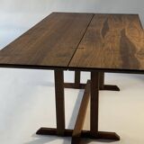 Exceptional dining table in solid walnut.