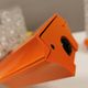 Bathroom lamps in a nice orange colour with a crystal glass shade and a base of hard thin plastic