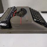 Old typewriter " hermes baby " swiss keyboard azerty