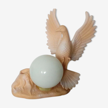 Lampe d'ambiance a poser en ceramique terre cuite opaline oiseau en plein vol