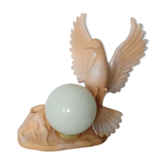 Ambient lamp to be placed in ceramic terracotta opaline bird in mid-flight