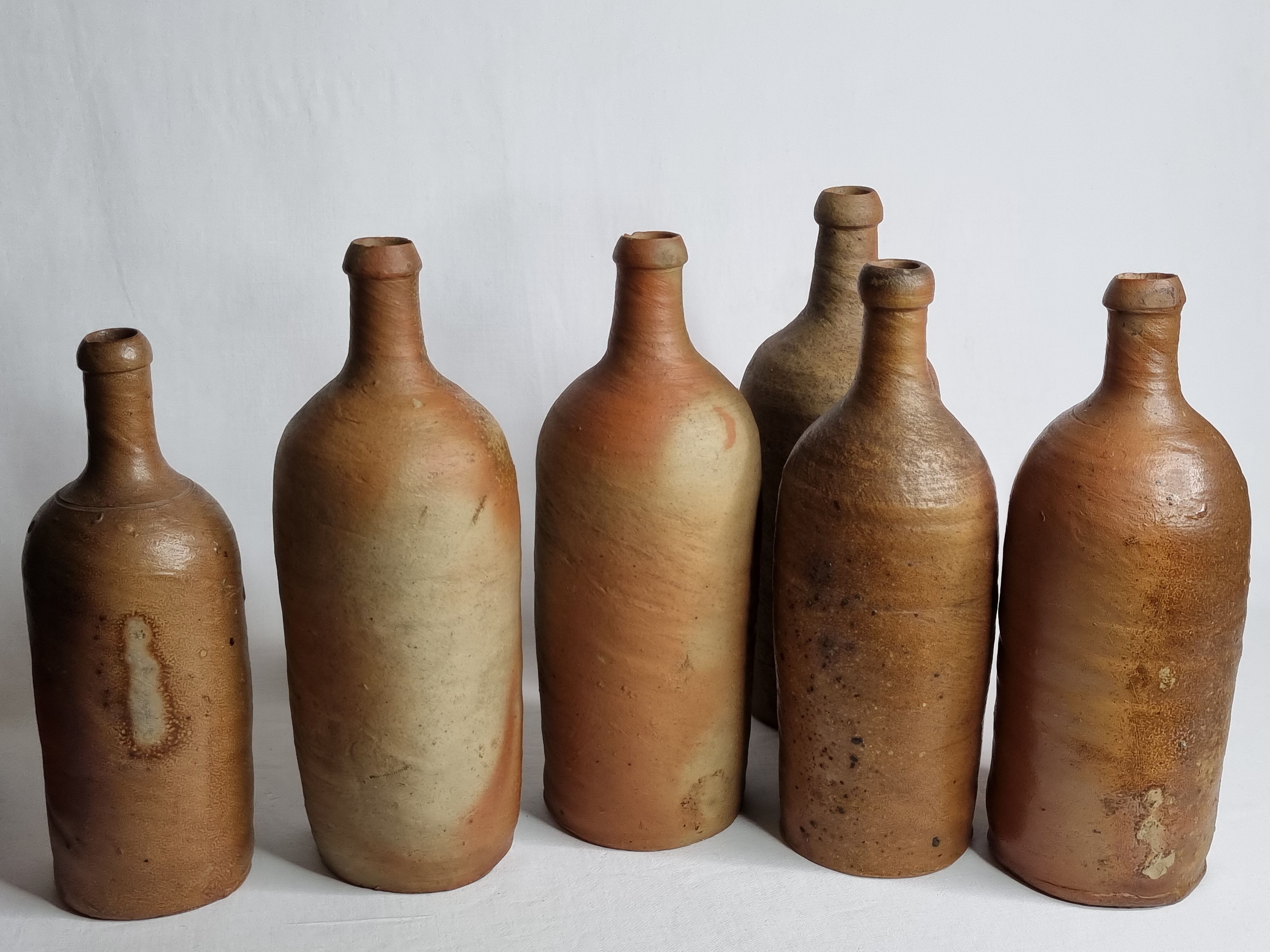 Set of 6 hand-turned stoneware bottles, 31 cm