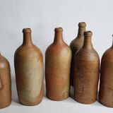 Set of 6 hand-turned stoneware bottles, 31 cm