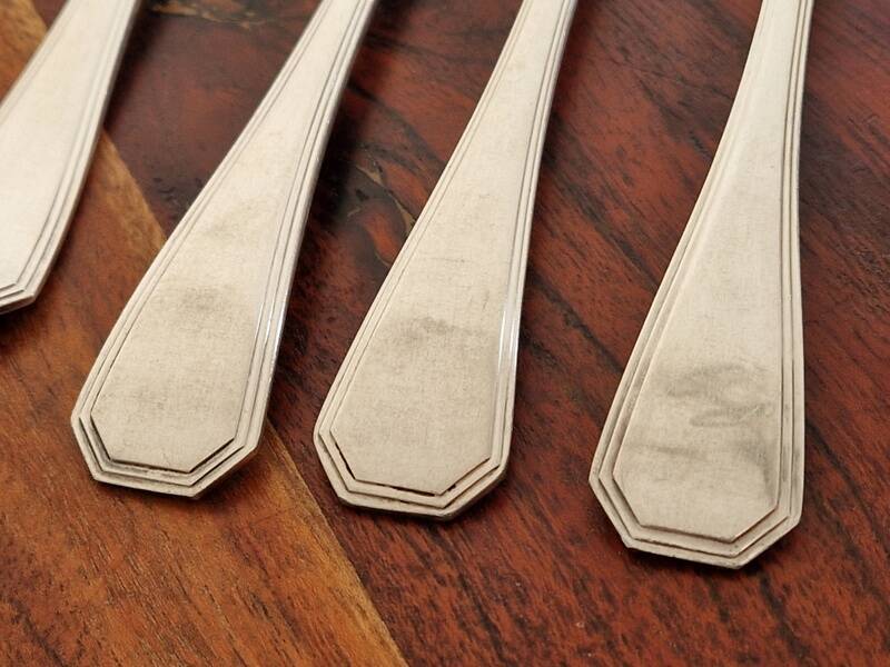 9 fourchettes de table Christofle en métal argenté modèle America - Design Luc Lanel