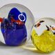 Set of two sulphides, glass paperweight with fish decorations