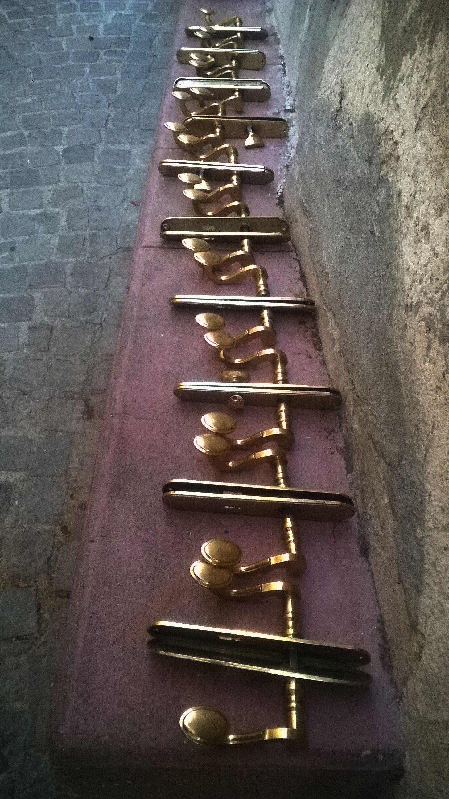 Series of ten sets of vintage door handles