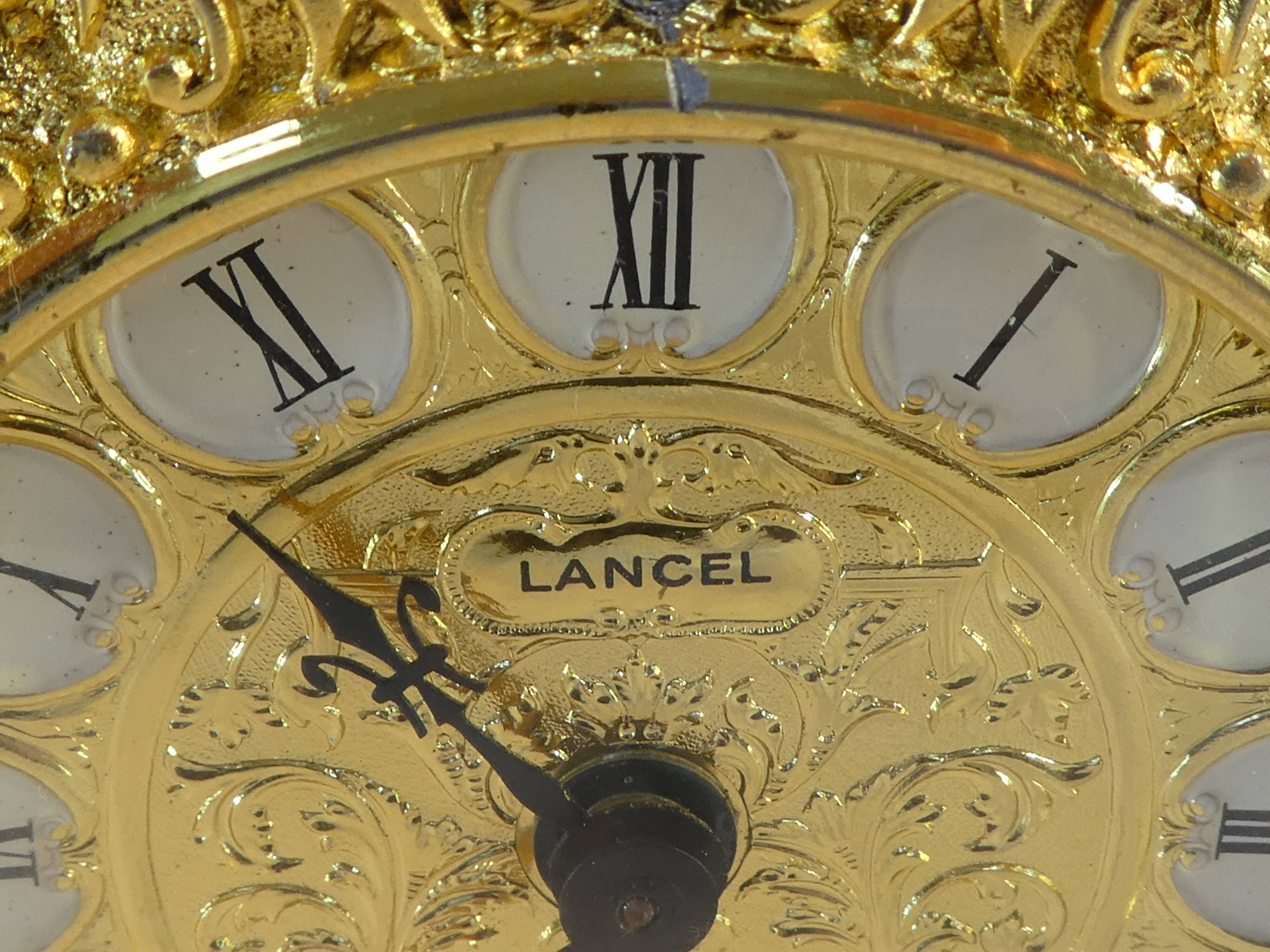 LANCEL alarm clock in chiseled bronze and gilded metal
