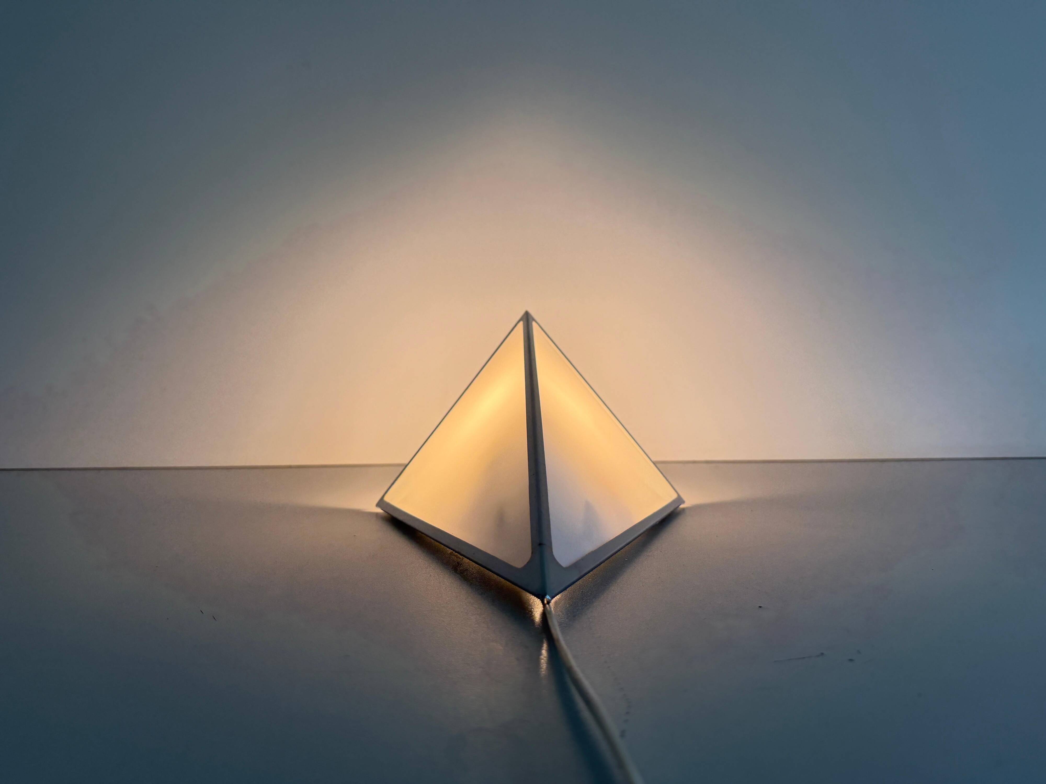 Simple opal glass wall light with an aluminium body, 1980s, Germany.