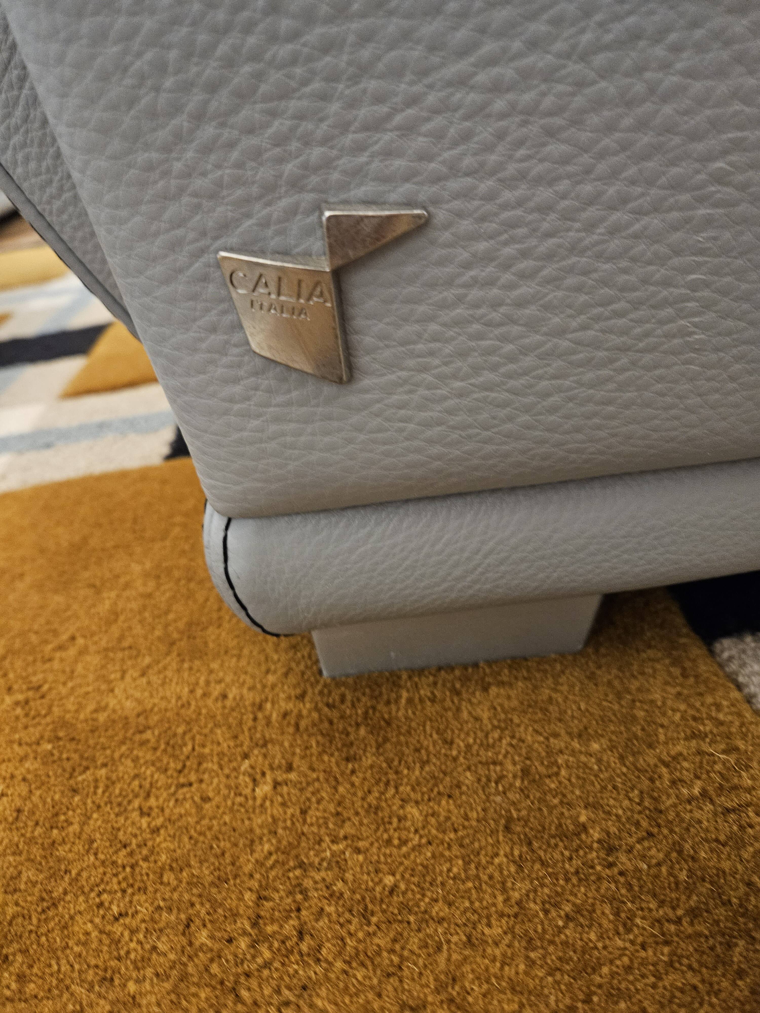 3-seater sofa, 2-seater sofa and an armchair in grey leather by Calia Italia.