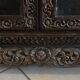 Thai trapezoidal display cabinet in carved solid wood