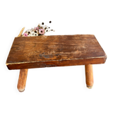 Low wooden stool