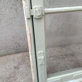 Old window mounted as a fenestron