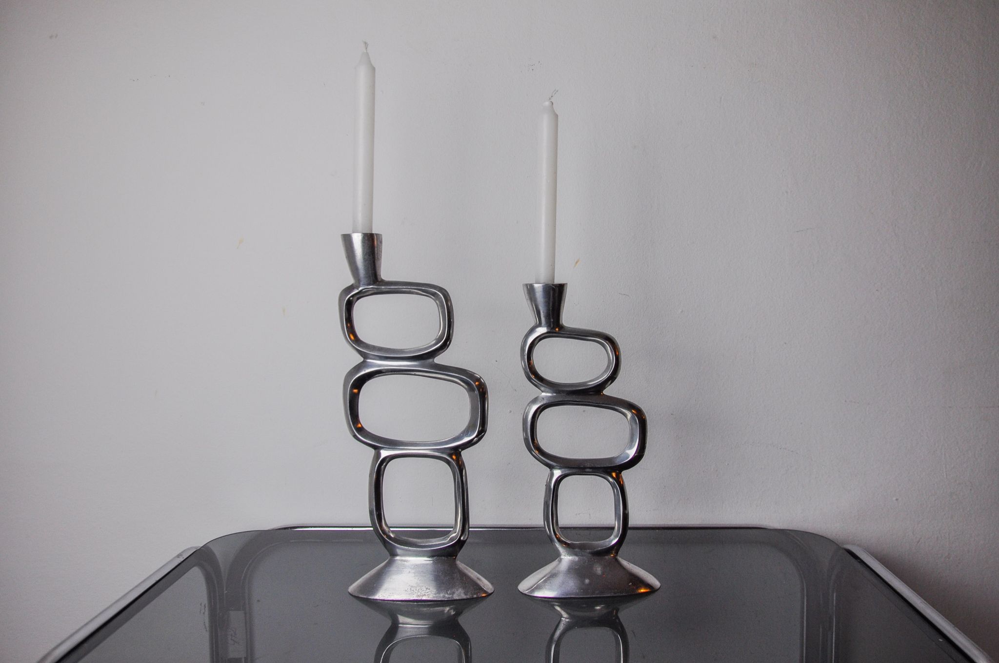 Pair of circle candlesticks by Matthew Hilton, England, 1980