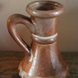 Small vintage marbled stoneware candlestick with handle