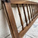 Old children's bed with retractable walnut bars