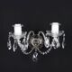 Antique wall light with 2 lights from the 1900s, featuring crystal bobeches and pendants.