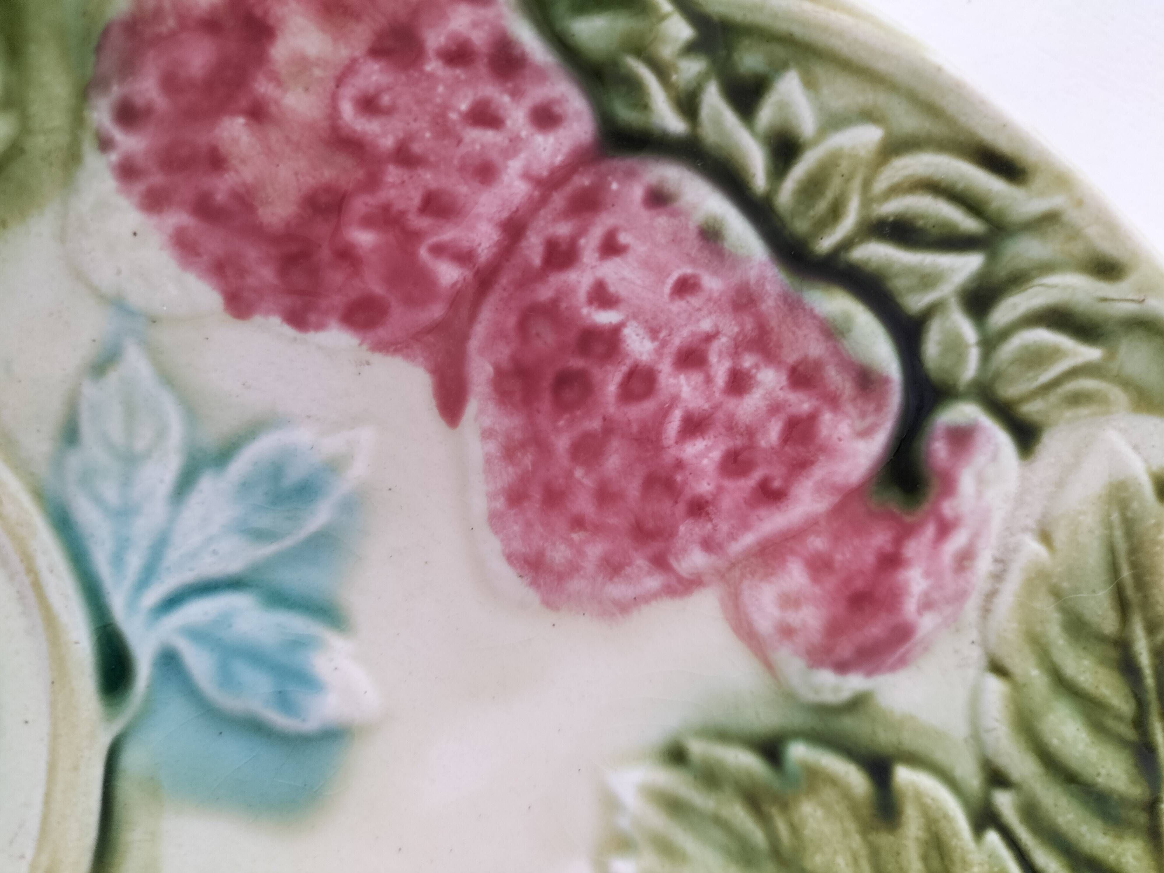 Barbotine plate with strawberries in relief, late 19th and early 20th century