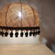 Large hanging pendant light with a burlap and pom-pom style