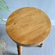 Wooden tripod stool