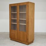 Oak glass-fronted school cabinet 1960