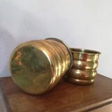 Duo of brass pot covers