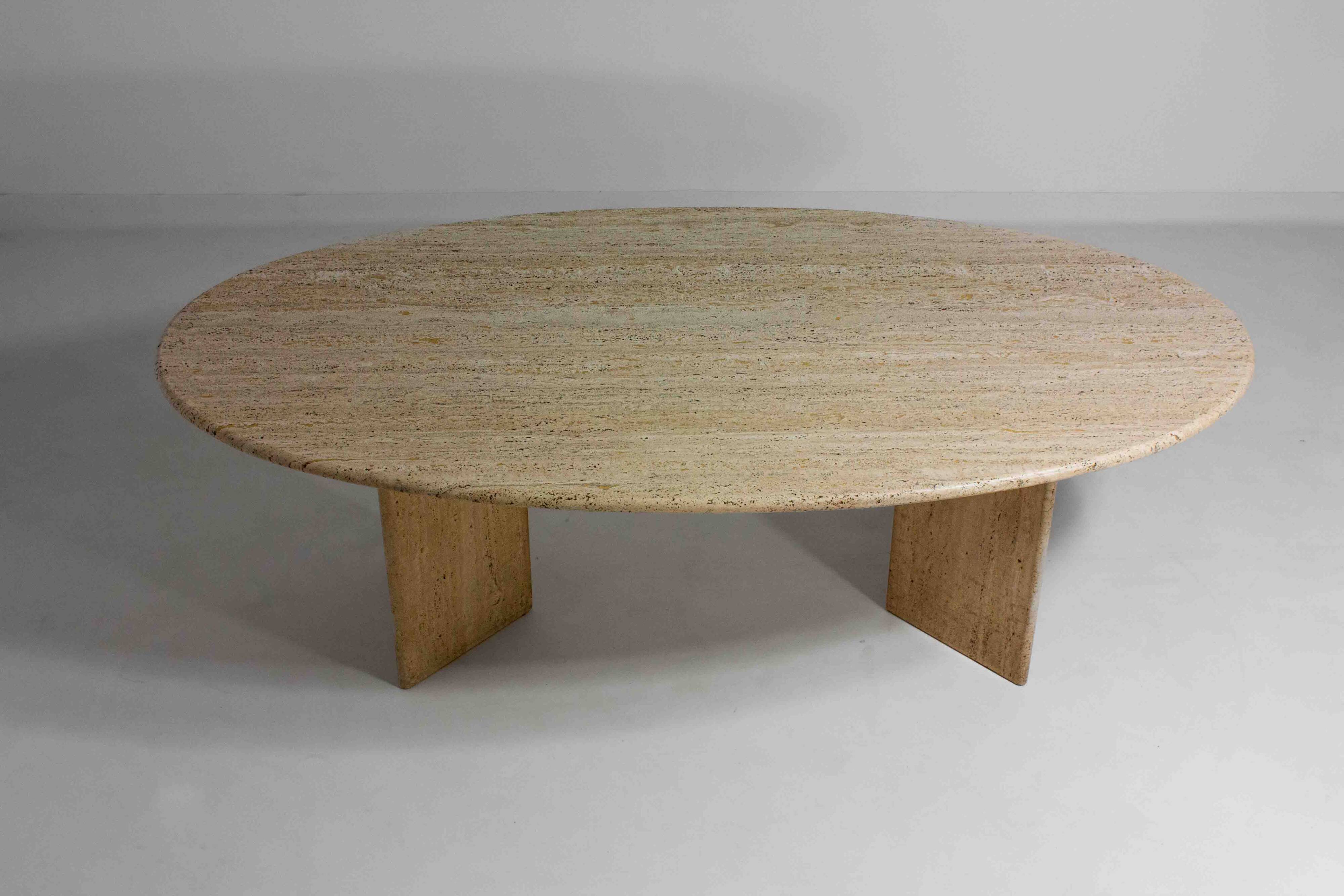 Large oval dining table in natural travertine, Italy 1970s