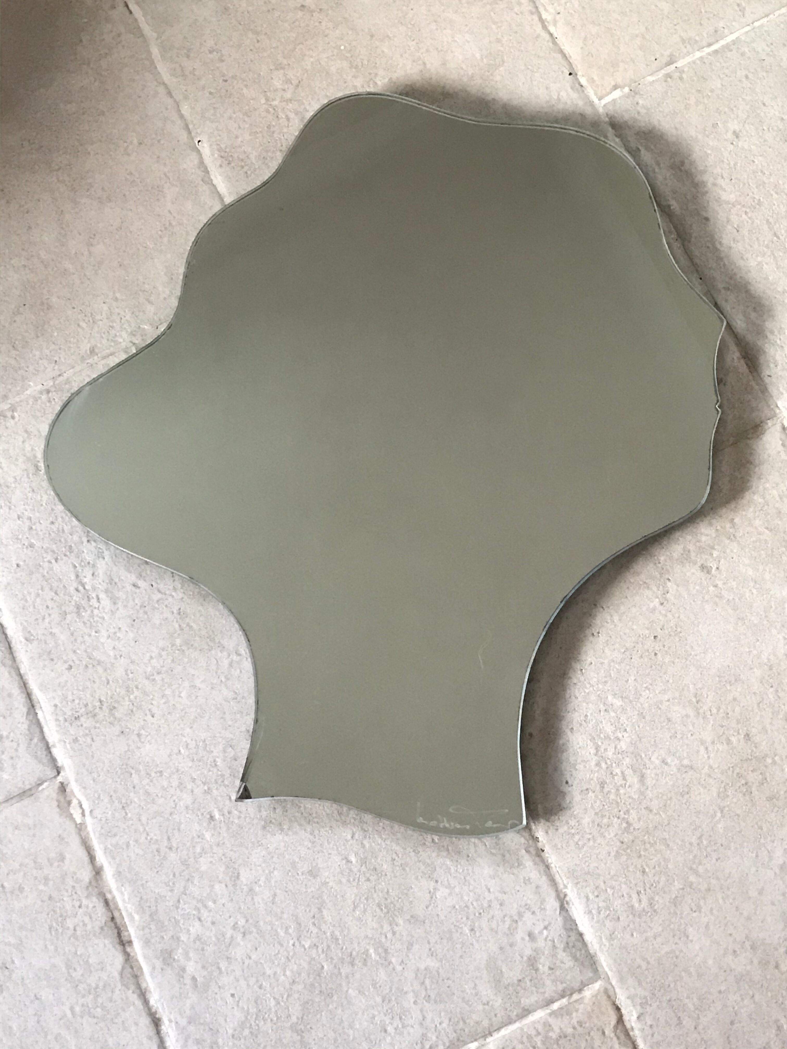 Free-form mirror signed Mathias 55x59cm