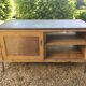 Antique workshop cabinet with sliding doors