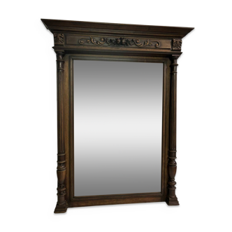 Beveled mirror in solid walnut frame