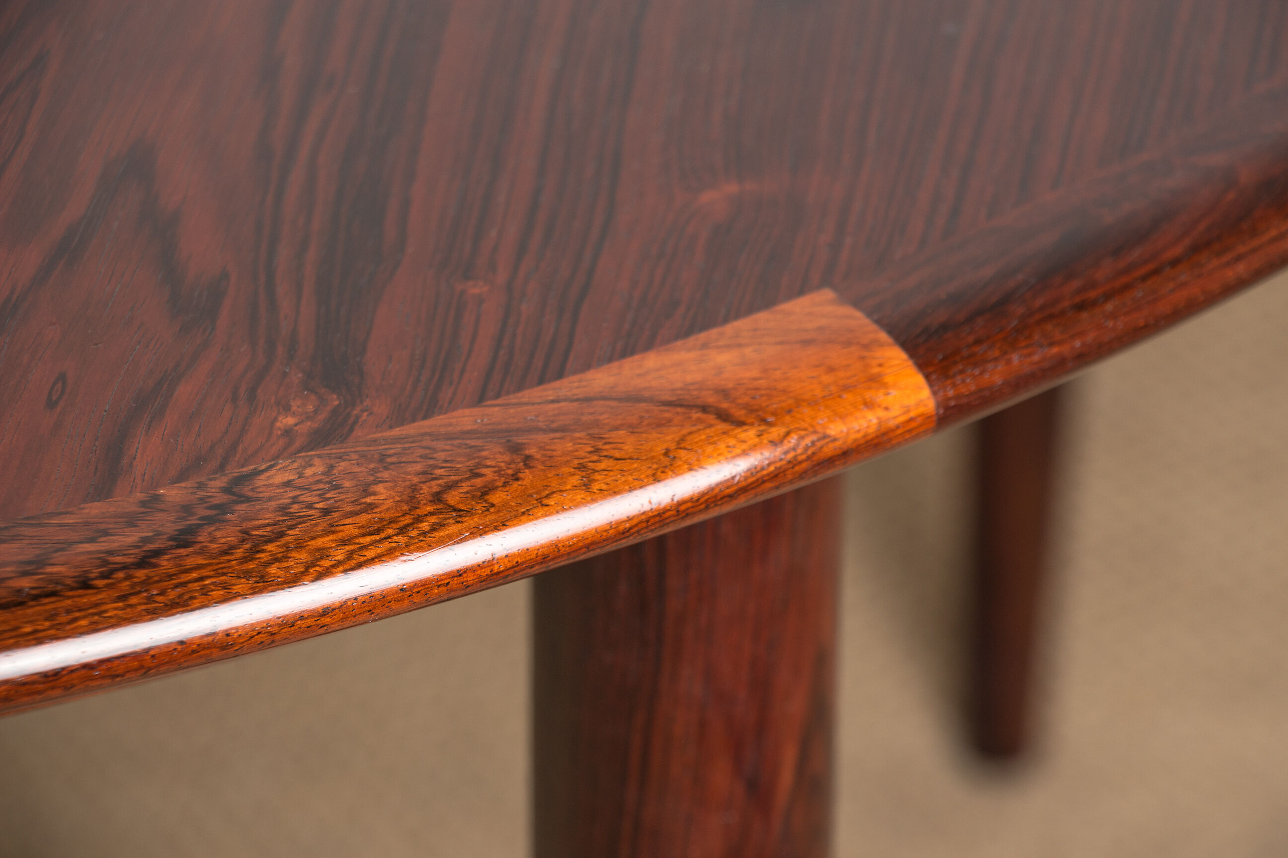 Danish extendable dining table in Rio Rosewood model 55 by Arne Vodder for Sibast 1958.