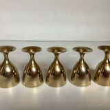 Five brass egg cups