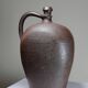 Large stoneware jar from Normandy with lustrous burgundy glaze, from the 1920s-30s.