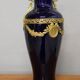 Vase signed Legastelois in blue ceramic of Sèvres and gilded bronze