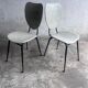 Elegant pair of French dining chairs by Jacques Hitier from the 1950s.