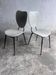 Elegant pair of French dining chairs by Jacques Hitier from the 1950s.